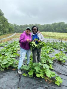 AfriThrive Founder & CEO Truphena Choit with Volunteers Coordinator Piah Njeru at the AfriThrive Cultural Farm in Poolesville.